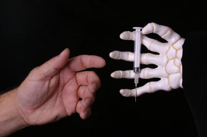 Needle and skeleton hand