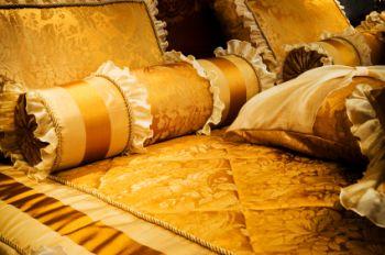 Standard sets include bed skirt and pillow shams.
