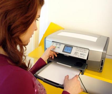 Woman using a printer