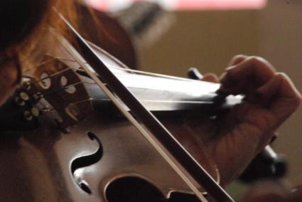 A person playing a violin