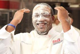 Chef Dana Herbert covered in flour