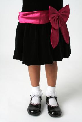 Little girl in lace socks