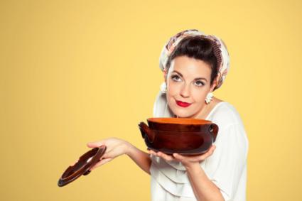 Woman preparing soup