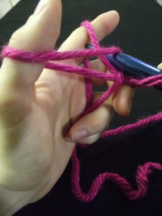 Step 3 of casting on a knitting stitch.