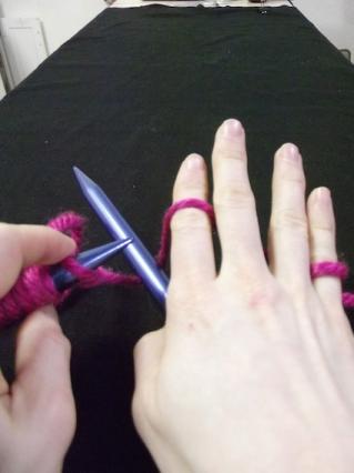 Step two of how to hold the yarn for knitting