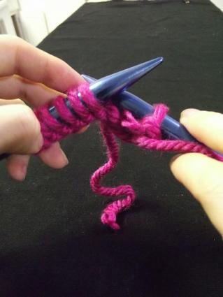 Step six of purling for knitting