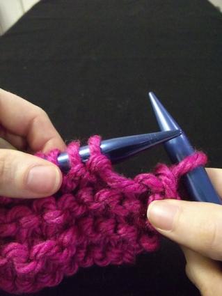 Step three of binding off for knitting