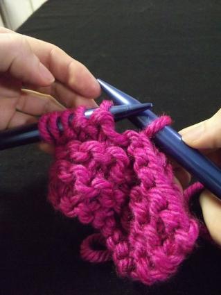 Step four of binding off for knitting