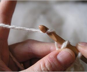 doing a crochet stitch