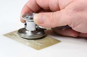 Nonprofit hospitals are providing only slightly more free care than for-profits, a study finds.
