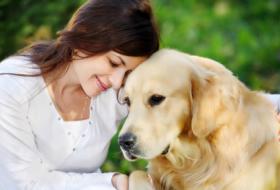 Golden with his caregiver
