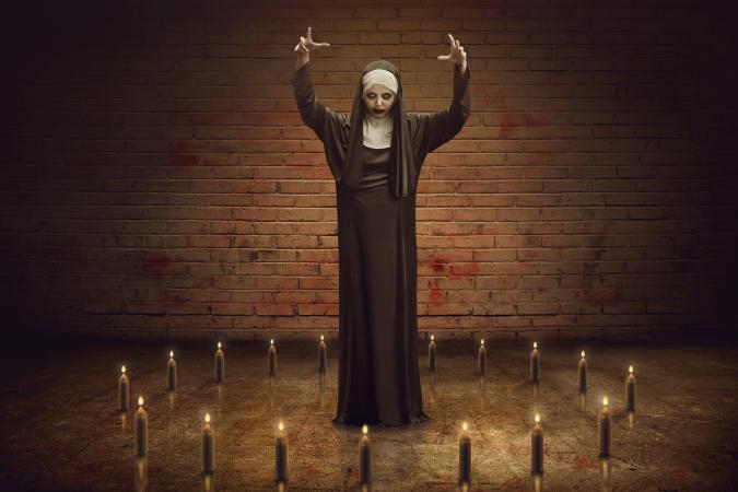 Scary Nun with candles