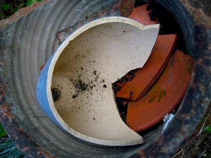 Broken plant pot pieces