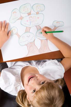 Little girl drawing her family tree