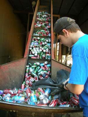 Worker Sorting Cans