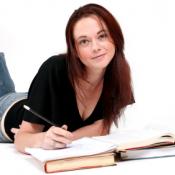 Teenager studying her books.