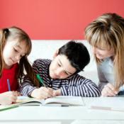 mom and kids homeschooling