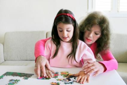 mother and child with puzzle