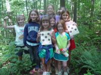 Campers Pose in the Woods