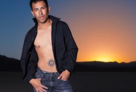 guy in jeans at sunset