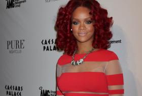 Rihanna in striped dress