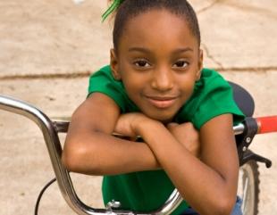 African-American girl on bike
