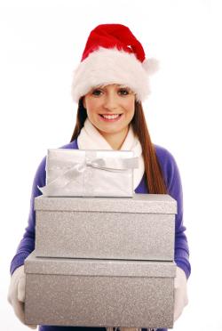 Girl with Christmas boxes