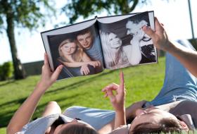 couple looking at photo book
