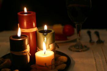 A plate lit by candlelight.