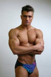 muscle man in speedo-style swimwear