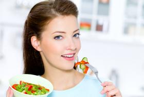 Woman Eating Carrot