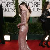 Anne Hathaway in a backless dress