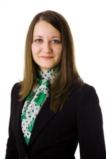 A woman in a suit.
