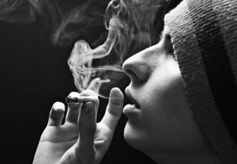 Teenager smoking marijuana