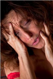 Woman experiencing opiate withdrawal symptoms