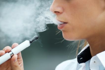 Woman smoking e-cigarette