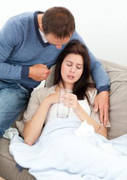 Attentive man caring for woman