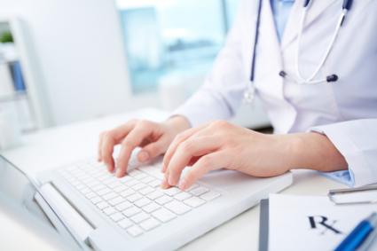 Doctor checking prescription guidelines; © Dmitriy Shironosov | Dreamstime.com