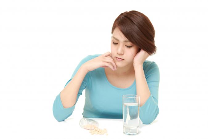 woman with pills