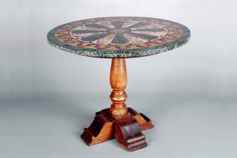 Round table with inlaid marble top