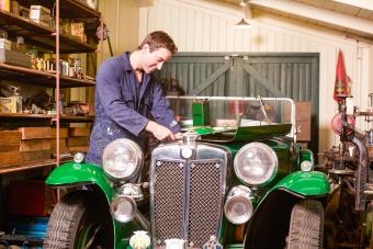 Mechanic working on classic car