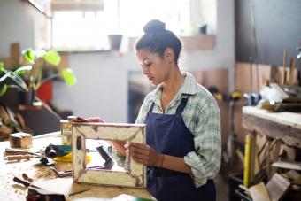 Craftswoman working in her workshop 