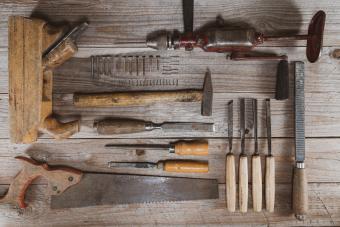 variety of antique tools displayed on table