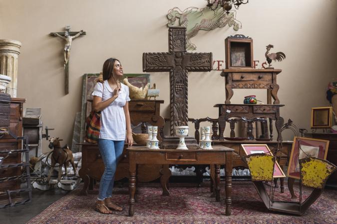 Woman shopping in antique store