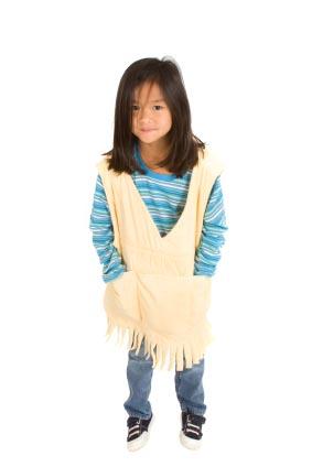 Girl wearing weighted sensory therapy vest.