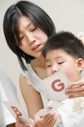 tutor working with young student