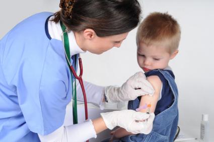 doctor giving vaccine