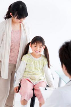 Doctor examining a child