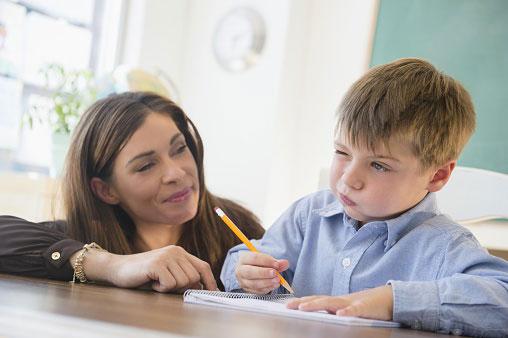 Teacher with student