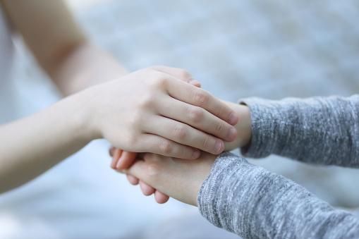 adult and child hands